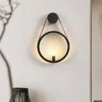 Серия настенных светильников с рельефным стеклянным плафоном в форме линзы на кожаном ремешке ODMAR Black ImperiumLoft