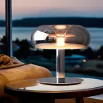 Серия настольных светодиодных ламп со стеклянным тороидальным плафоном на центральной стойке KIDDY Chrome от ImperiumLoft