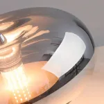 Серия настольных светодиодных ламп со стеклянным тороидальным плафоном на центральной стойке KIDDY Black от ImperiumLoft