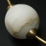 Серия подвесных светильников арочной формы с элементами из испанского мрамора и брашированой латуни VERITY B от ImperiumLoft