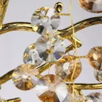 Серия люстр с подвесным декором из прозрачного и тонированного хрусталя на ветвистом каркасе FLAMB L10 от ImperiumLoft