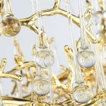 Серия люстр с подвесным декором из стеклянных капель на ветвистом каркасе люстра WATERDROPS L10 Goldот ImperiumLoft