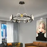 Светодиодная люстра с кольцевидными плафонами с чередующими металлическими дисками на черном кольцевом каркасе BENEDIKTA 3000K от ImperiumLoft