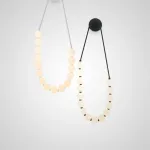 Серия настенных светодиодных светильников с белыми шарообразными плафонами на подвесном тросе Nano Orb White от ImperiumLoft