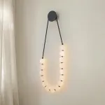 Серия настенных светодиодных светильников с белыми шарообразными плафонами на подвесном тросе Nano Orb Black от ImperiumLoft