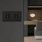 Розетка двойная (двухпостовая) с заземлением и шторками Arte Milano SET16-2-40-1x2 black от ImperiumLoft