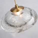 Подвесной светильник ANSEL A Transparent Brass с плафоном неправильной формы из стекла ручной работы с эффектом воздушных пузырьков от ImperiumLoft
