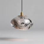 Подвесной светильник ANSEL A Transparent Brass с плафоном неправильной формы из стекла ручной работы с эффектом воздушных пузырьков от ImperiumLoft