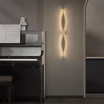 Настенный светильник из двух симметрично изогнутых контурных полос с LED подсветкой Бра JARAND H60 от ImperiumLoft