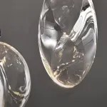 Настенный светильник в виде выгнутого диска с LED подсветкой Бра AQUILA WALL Brass от ImperiumLoft