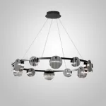 Серия светодиодных люстр с дисковидными рассеивателями из рельефного стекла разного размера на кольцевом каркасе RUTGER R D100 Black от ImperiumLoft