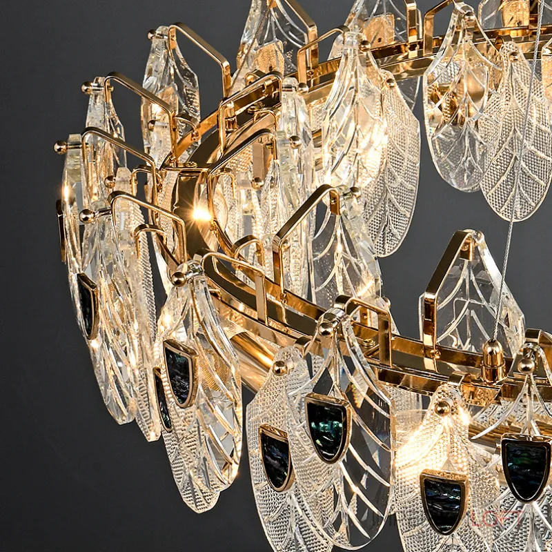 Серия люстр из хрустальных подвесок с разной фактурой в виде стилизованных листьев и вставками из перламутра на кольцевом каркасе RAIMON D60 от ImperiumLoft