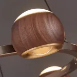 Подвесная люстра с шарообразными плафонами из металла и массива дерева c двунаправленным LED-свечением на кольцевом каркаса ERNAR от ImperiumLoft