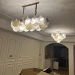 Серия люстр с многоярусным абажуром из подвесок в виде листьев гинкго из матового и прозрачного стекла и из металла LILLEN B от ImperiumLoft