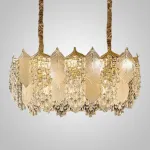 Серия люстр с многоярусным абажуром из подвесок в виде листьев из стекла и декором из хрустальных бусин разной формы VIRGILIO от ImperiumLoft
