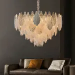 Серия люстр с многоярусным абажуром из подвесок в виде листьев из стекла, металла и керамики OLEANDER от ImperiumLoft