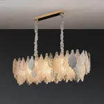 Серия люстр с многоярусным абажуром из подвесок в виде листьев из стекла, металла и керамики OLEANDER от ImperiumLoft