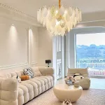 Серия люстр с многоярусным абажуром из подвесок в виде листьев из стекла, металла и керамики OLEANDER от ImperiumLoft