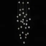 Каскадный светильник с комбинацией из 30-ти стеклянных подвесов в форме призм и сфер с концентрическим рельефом STYRK COMBO от ImperiumLoft