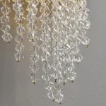 Настенный светильник с декором из хрустальных ограненных подвесок на латунном ободе с рельефным «хищным» узором Бра TIGER WALL S от ImperiumLoft