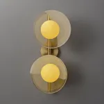 Настенный cветильник с кремово-желтыми шарообразными плафонами внутри стеклянных купольных рассеивателей разной фактуры ROMANUS WALL M от ImperiumLoft