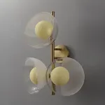 Настенный cветильник с кремово-желтыми шарообразными плафонами внутри стеклянных купольных рассеивателей разной фактуры ROMANUS WALL L от ImperiumLoft