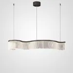 Серия реечных светильников с линейной гравировкой на прозрачном изогнутом корпусе со светодиодной подсветкой DANELIUS LONG L100 от ImperiumLoft