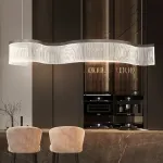 Серия реечных светильников с линейной гравировкой на прозрачном изогнутом корпусе со светодиодной подсветкой DANELIUS LONG L150 от ImperiumLoft