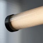 Реечный светодиодный рядный светильник на стойке с вытянутым цилиндрическим корпусом TEOFIL B L160 от ImperiumLoft