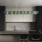 Реечный светильник с оригинальными рассеивателями в виде стилизованных бабочек из фигурного цветного стекла DEXTER LONG L95 BLUE от ImperiumLoft