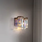 Настенный светильник с абажуром из ограненных хрустальных пластин с эффектом красочных переливов DORIS WALL от ImperiumLoft